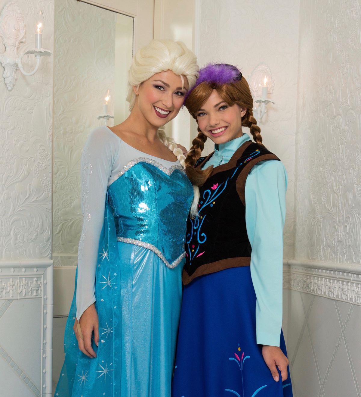 Anna princess character at a children's birthday party playing games with kids